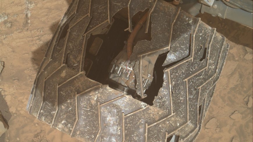 New NASA images reveal giant hole in Curiosity rover's wheel after 12 years of 'abuse' on Mars --[Reported by Umva mag]