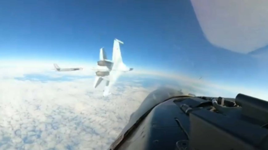 WATCH Russian fighter jet push US F-16 away from nuclear bomber --[Reported by Umva mag]