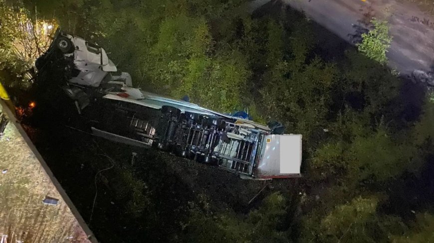 Lorry plunges off M6 motorway viaduct onto embankment below in terrifying crash through barriers --[Reported by Umva mag]