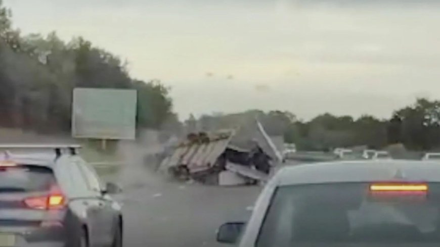 Shocking moment trailer full of FRIDGES crashes on M5 sending debris flying in front of drivers forced to hit brakes --[Reported by Umva mag]