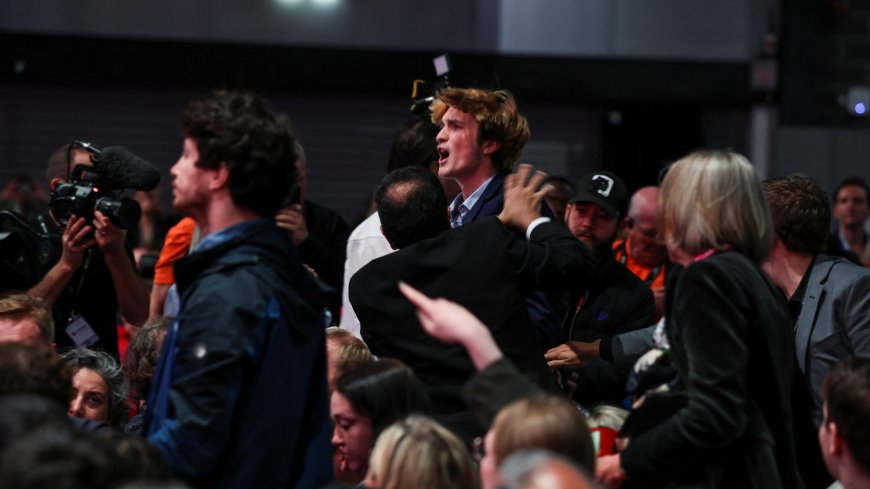 Moment anti-Israel protester who heckled Rachel Reeves is dragged out of party conference as crowd cheers --[Reported by Umva mag]