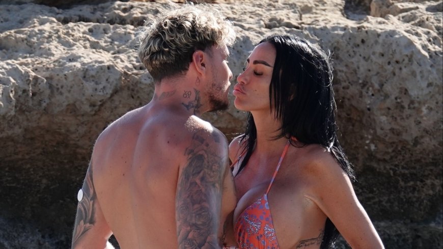 Katie Price strips off to bikini and shows off her huge boobs and tattoos as she kisses boyfriend JJ Slater on the beach --[Reported by Umva mag]