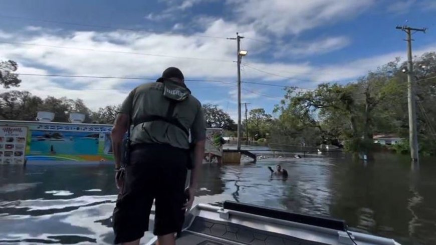 Florida deputies rescue boy floating on piece of fence in floodwaters --[Reported by Umva mag]