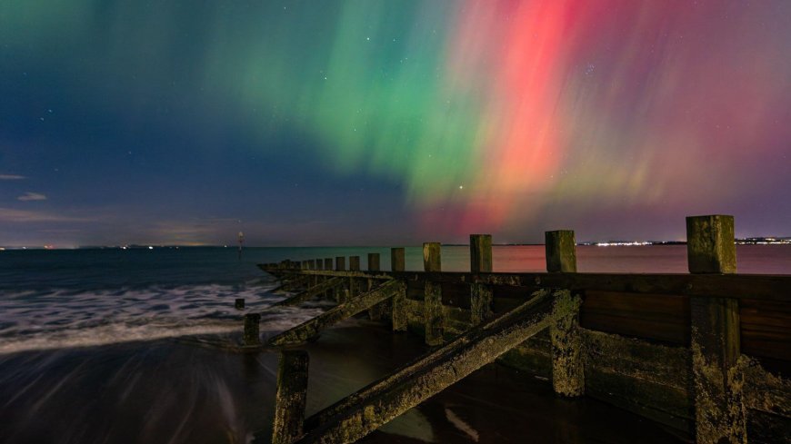 Northern Lights seen across the UK as stunning photos show the aurora lighting up the night sky --[Reported by Umva mag]