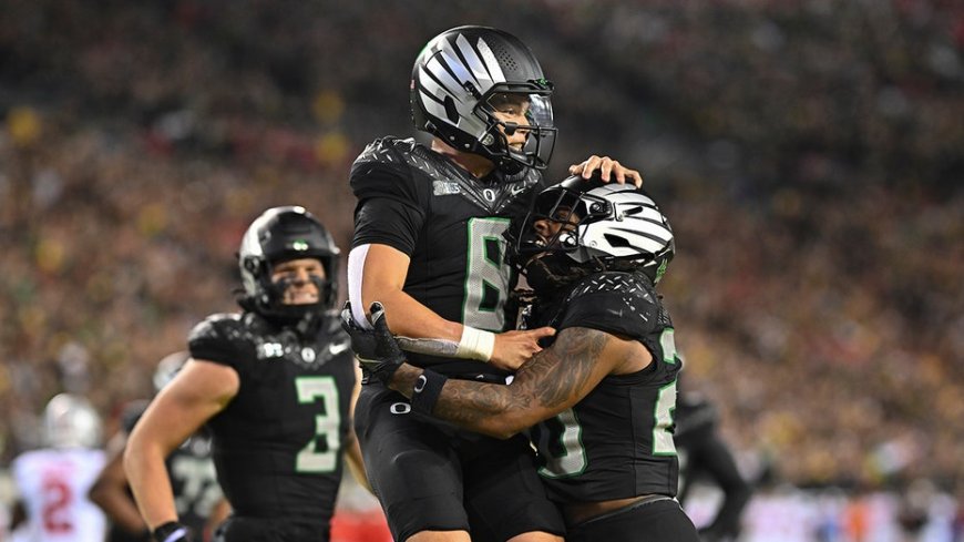 Oregon holds off Ohio State's final-second comeback in epic battle of top-three Big Ten programs --[Reported by Umva mag]