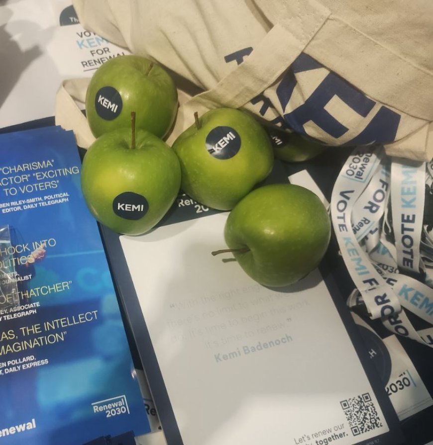 Brits left baffled after apples promoting Kemi Badenoch spotted at Conservative conference --[Reported by Umva mag]